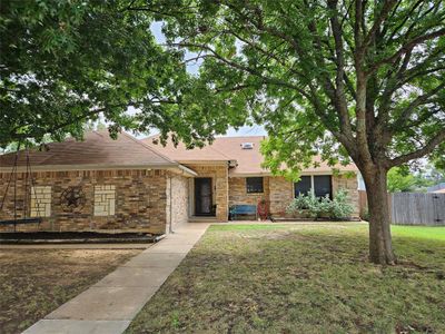 Single story home with a front lawn | Image 1