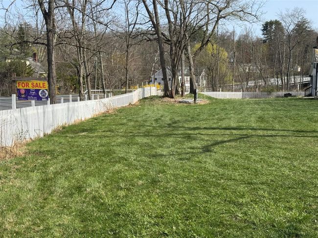 View of yard featuring fence | Image 35