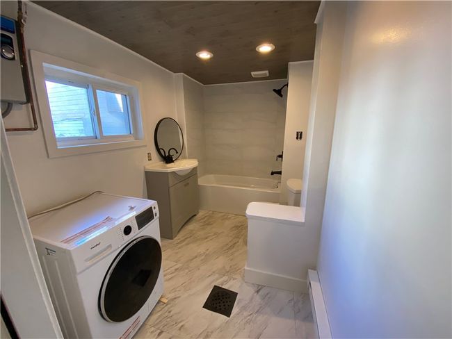 Renovated 2 yrs ago - all new plumbing, fixtures & a european style W/D combo | Image 15
