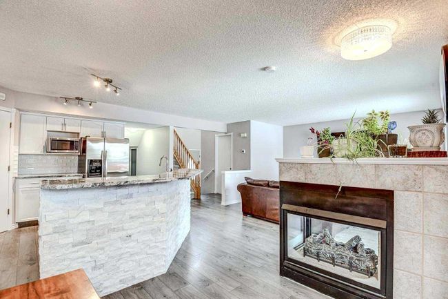 116 Bridlewood Circle Sw, Home with 3 bedrooms, 3 bathrooms and 4 parking in Calgary AB | Image 8