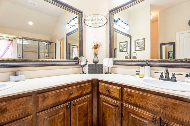 Full bath with vanity and a stall shower | Image 25