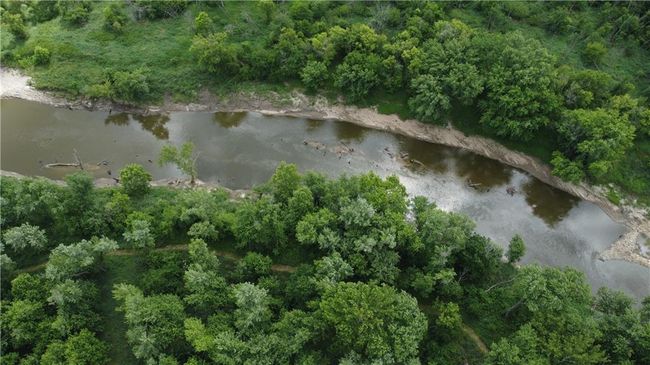 Aerial view of property and surrounding area with a nearby body of water | Image 54