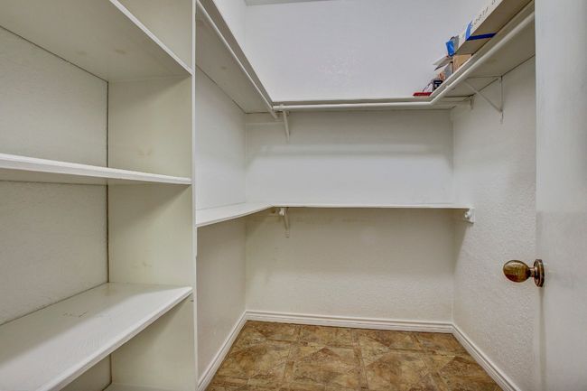 2nd Walk in closet with tile flooring | Image 22