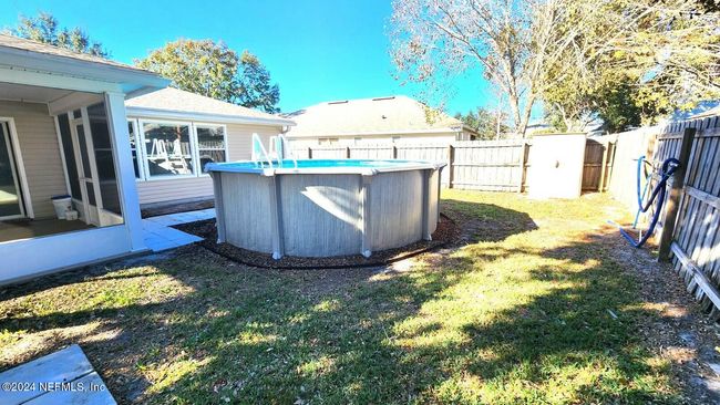 11775 Blueberry Ln, House other with 3 bedrooms, 2 bathrooms and null parking in MACCLENNY FL | Image 44