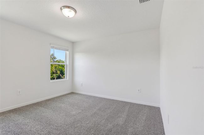 16419 Bird Of Paradise Ave, Townhouse with 3 bedrooms, 3 bathrooms and null parking in CLERMONT FL | Image 27