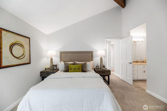 Hop out of bed and into your lovely primary bathroom | Image 20