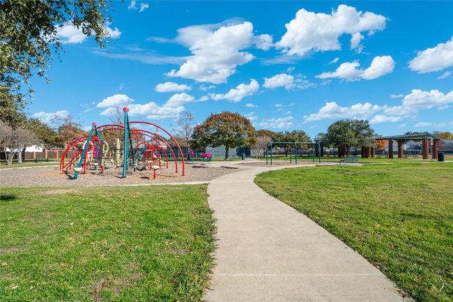 Community playground with a yard | Image 17