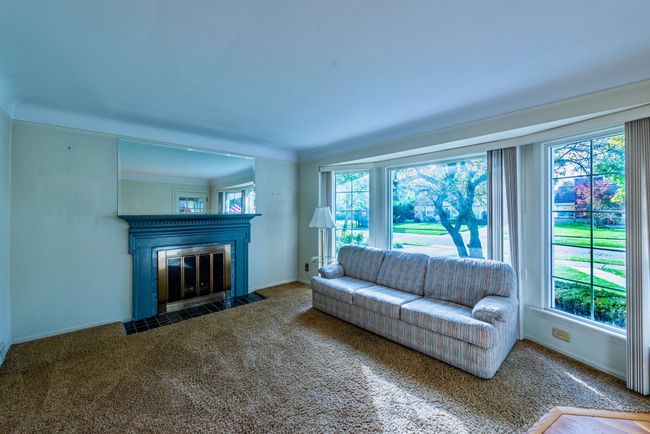 Living Room with Large Window & Fireplace | Image 5