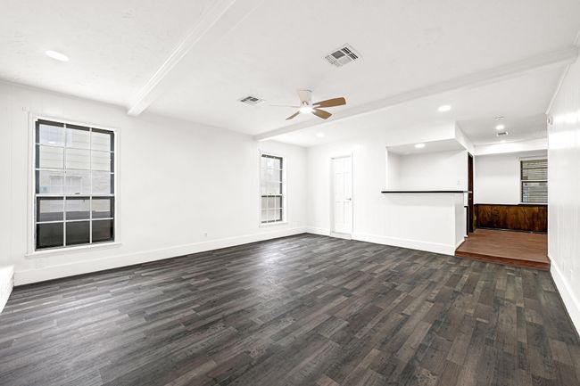 Formal living with a dry bar off the back and access to the formal dining room. | Image 10