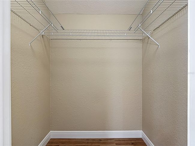 Primary walk-in closet | Image 25