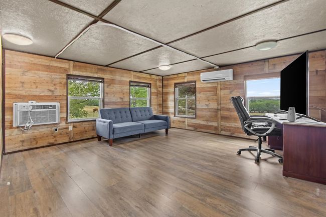 Nearby, a newer 800 sq ft duplex features two fully outfitted 400 sq ft units—each with a kitchen, tiled bath, and washer/dryer hookups—offering flexible guest or rental options. | Image 20