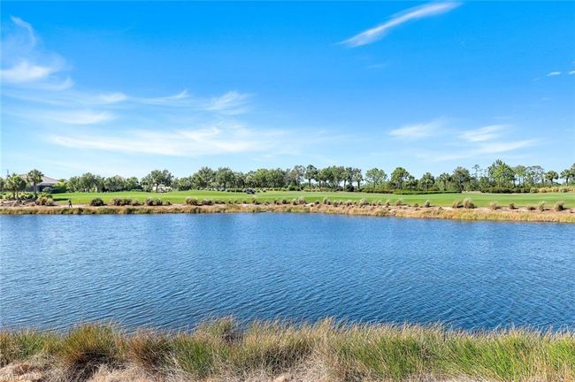 View from the back lanai - 7th Fairway and green. | Image 27