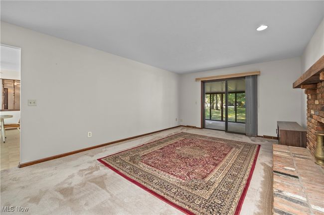 Family Room with slider to 4-Season Room | Image 15