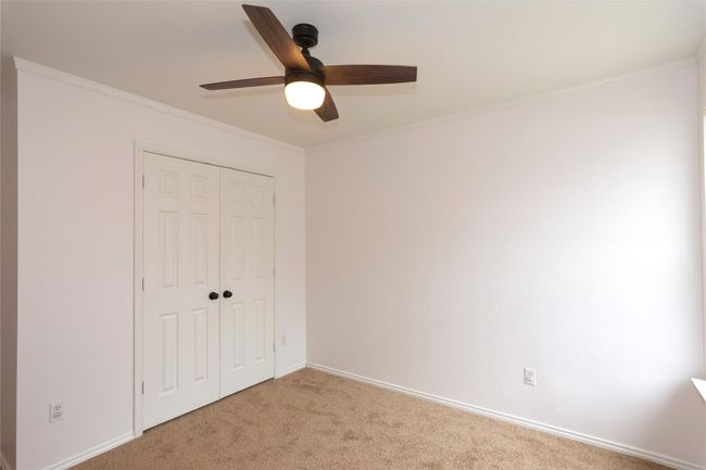 This bedroom has a wide closet | Image 24
