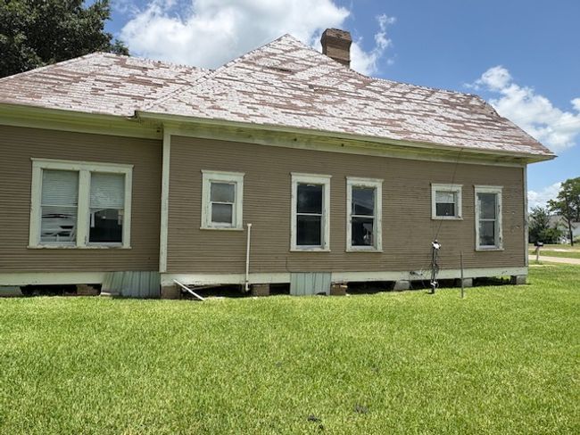 Back of house featuring a yard and a chimney | Image 13
