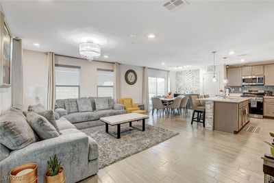 Living room adjacent to Kitchen and formal dining room | Image 1