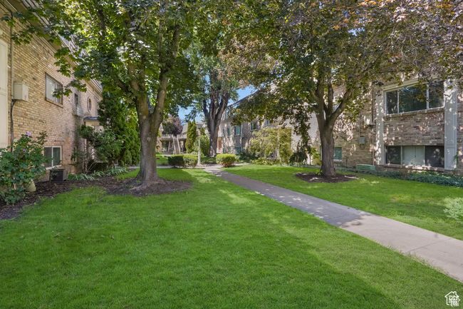 View of community with a yard | Image 25