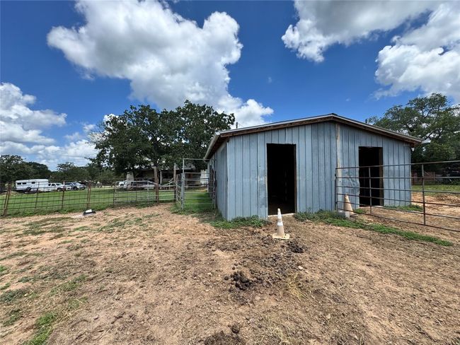 View of outbuilding with an exterior structure | Image 8