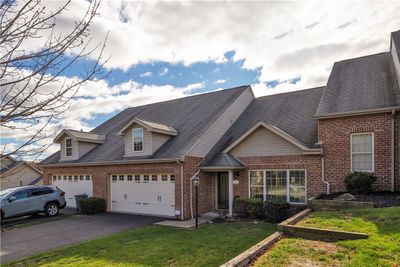 A Double Car Garage is Attached With Plenty Of Extra Space to Park in the Driveway | Image 3