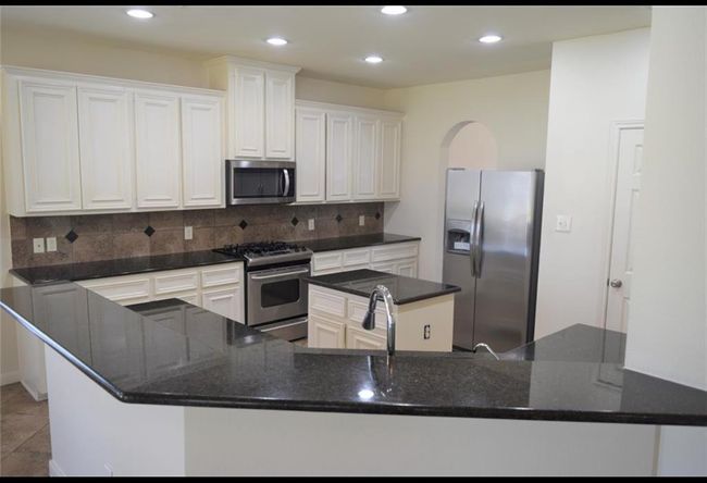 803 Lazy Springs Ln, House other with 5 bedrooms, 4 bathrooms and 3 parking in Spring TX | Image 6