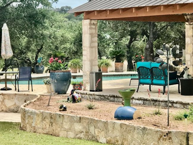 View of patio featuring an outdoor pool | Image 25