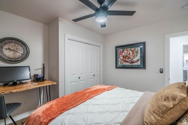 Bedroom featuring a closet and ceiling fan | Image 10
