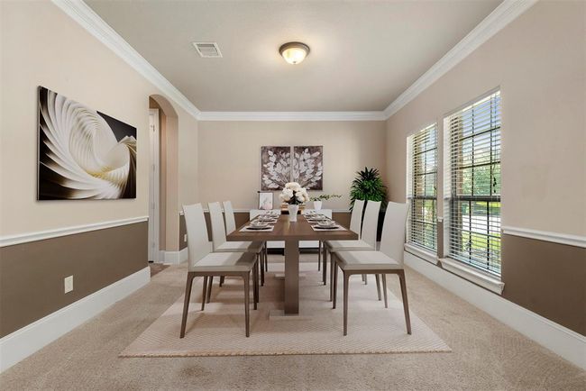 Flex room staged as a formal dining room. This room would also be a great craft room, playroom, home gym....whatever your need. Virtually staged. | Image 9