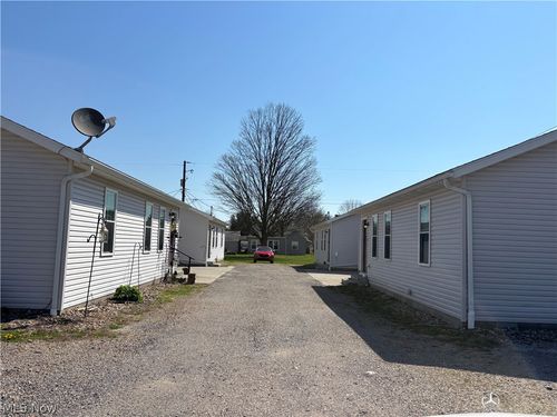 623 11th Dr Nw, New Philadelphia, OH, 44663-1036 | Card Image