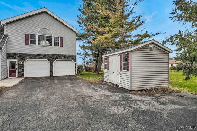 2.5 car attached garage and a spacious shed for all your storage needs | Image 4