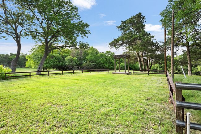 View of yard featuring fence | Image 6