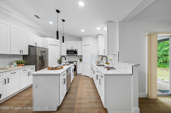 NEW STAINLESS STEEL APPLIANCES | Image 24