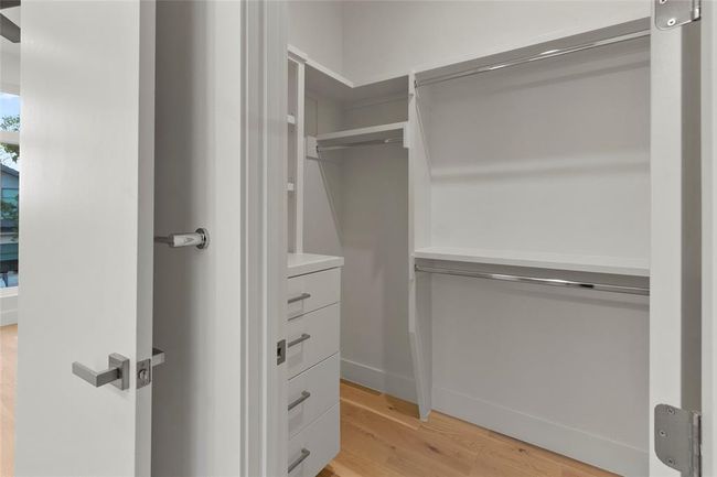 Secondary bedroom #2 custom closet | Image 27