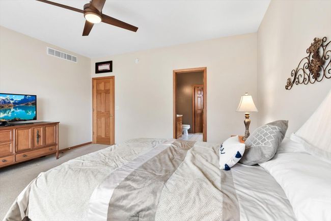 Private ensuite bathroom adds comfort and convenience to this lovely primary suite. | Image 27