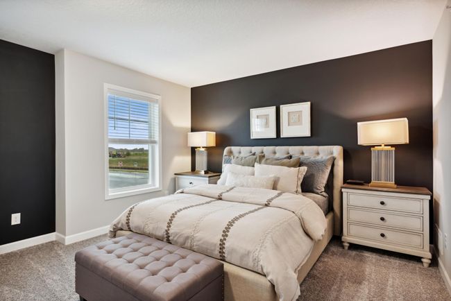 Large owners suite with private bathroom and walk in closet! *Photos are of a model home, some features and colors may vary. | Image 17