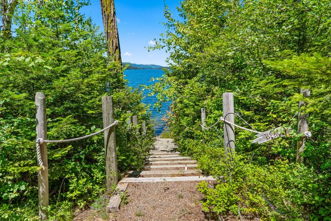 View of steps leading down to shoreline | Image 24