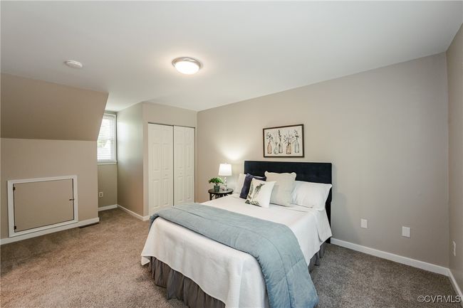 Bedroom 2 with baseboards, a closet, and light colored carpet | Image 36