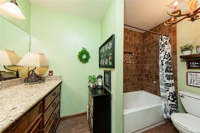 The secondary bathroom is situated in the hall and shared between the two secondary bedrooms. | Image 17