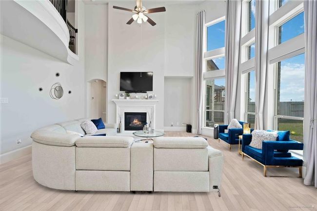 Living room brand new LVP flooring***photos staged from previous photos*** | Image 8
