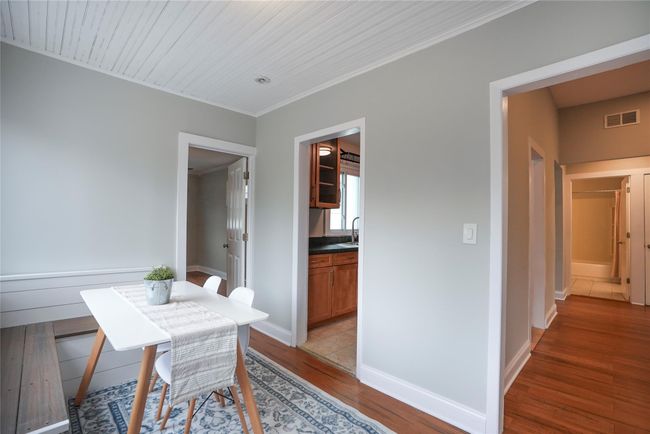Charming dining room w/ built in bench seating. | Image 8