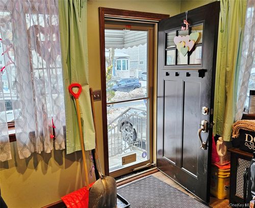 7757 76 Street, New York, NY, 11385 | Card Image