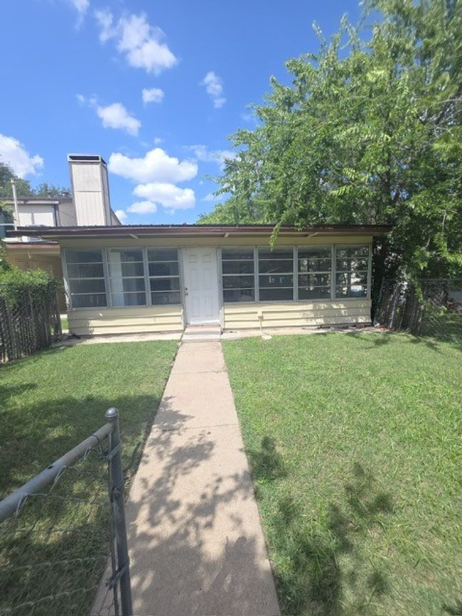 View of front of home featuring a chimney | Image 7