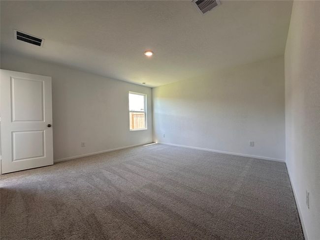 Spacious primary bedroom | Image 8