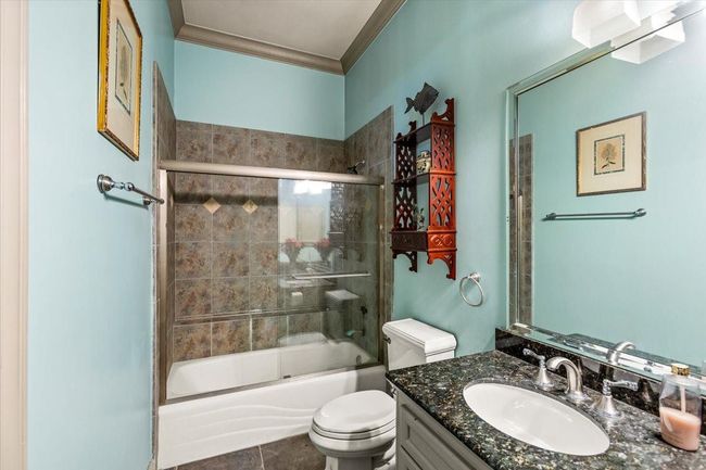 Full bath with built in shower means that you can work all night, sleep on a couch in the study, have a shower in the morning without ever leaving your work space. Not a bad commute to work! Kitchen is right next door, so easy to grab a snack when you need it. | Image 24