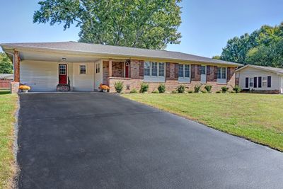 Welcome to 207 Donna Drive. This home has been updated inside and out, including a new roof. | Image 1