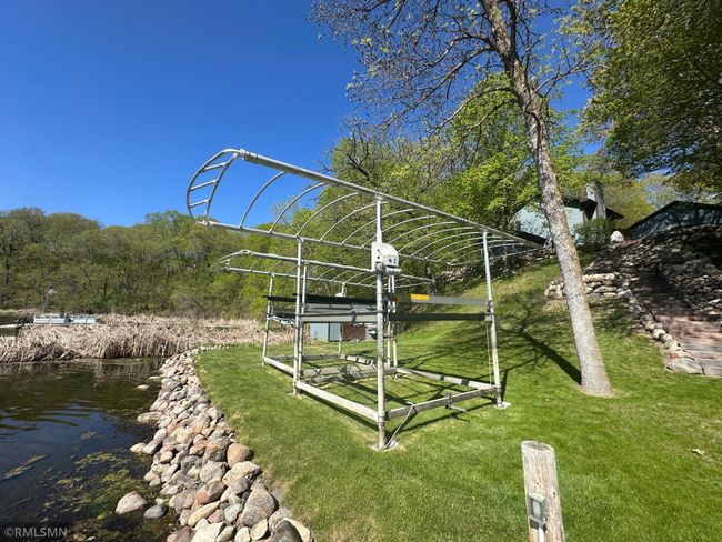 Rip Rap Shoreline and nice lakeside yard. Approximately 117 feet of lake shore graces this property offering plenty of space for relaxing or playing games. | Image 16