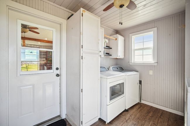 Another view of the utility room. Great storage here. Washer and dryer convey. | Image 13