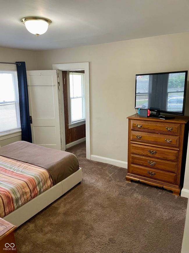 bedroom with baseboards and carpet flooring | Image 15