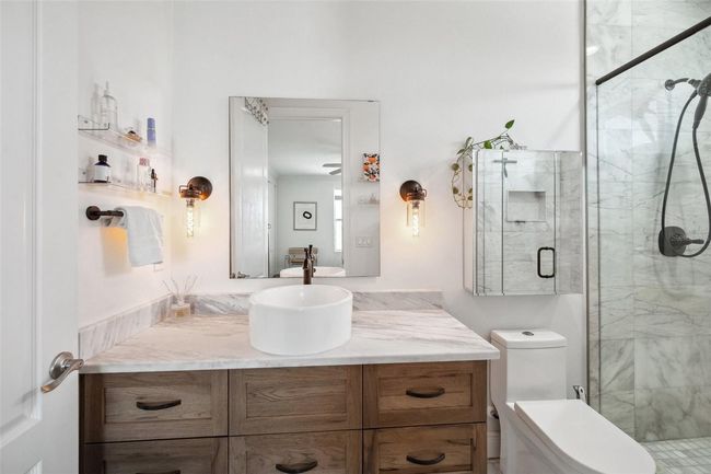 Another view of the secondary master bathroom. | Image 65