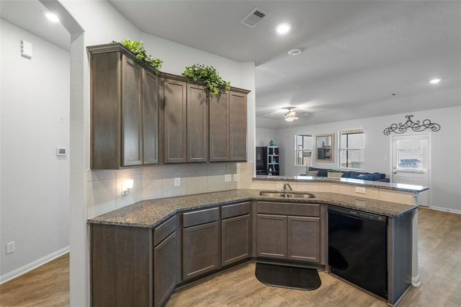View of the family room from the kitchen. | Image 15