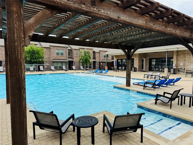 Community center offers a spacious and relaxing sparkling pool. | Image 39